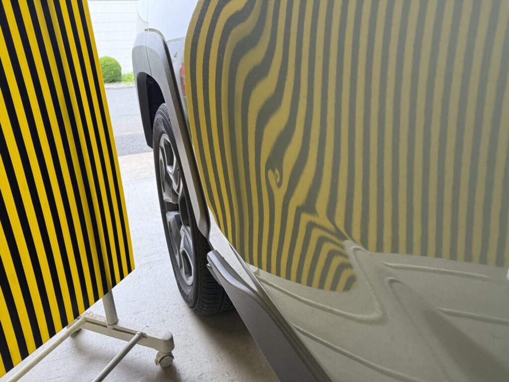 トヨタRAV4ドアパンチによるリヤドアのヘコミをデントリペアで修理