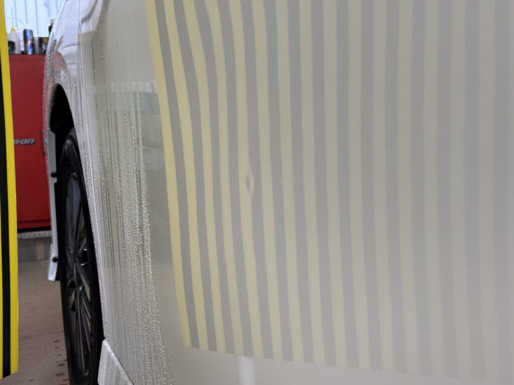 日産セレナ助手席ドアのヘコミをデントリペア