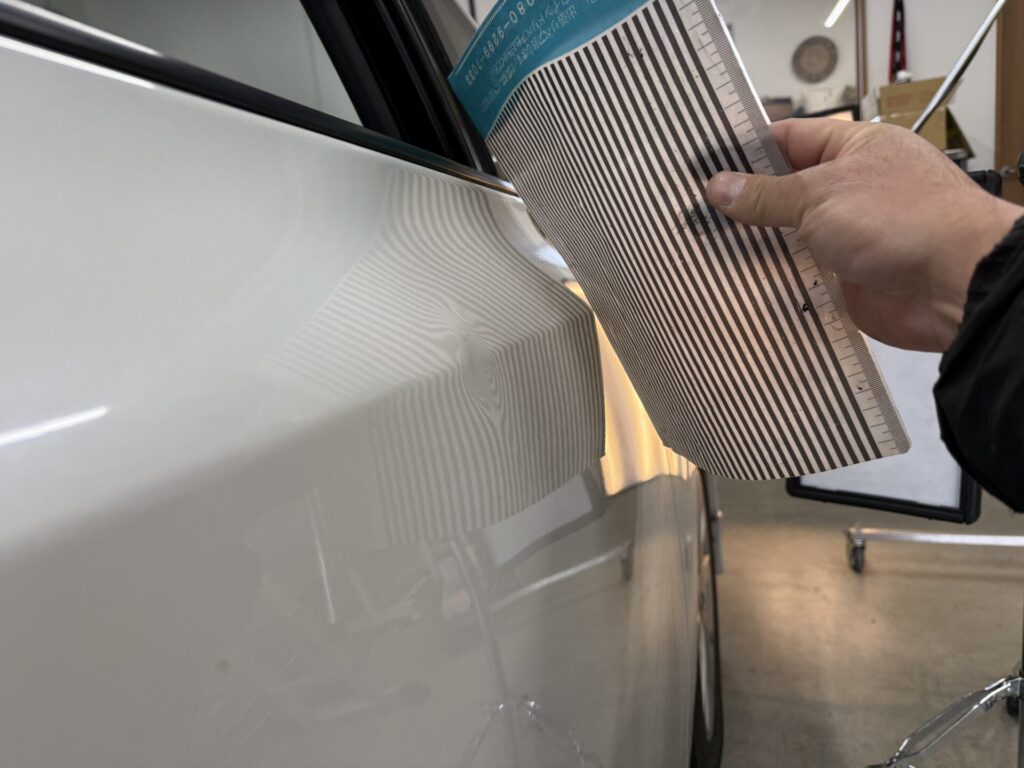 プリウスのドアパンチのヘコミをデントリペア