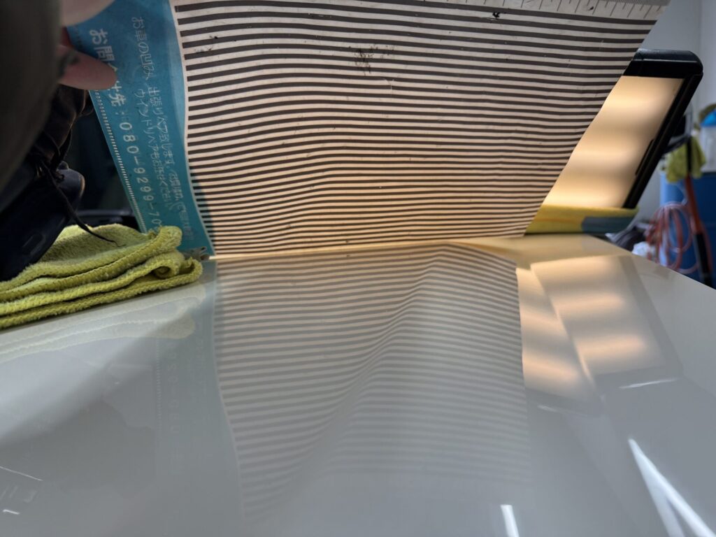 キャデラックエスカレードのボンネットのヘコミをデントリペア