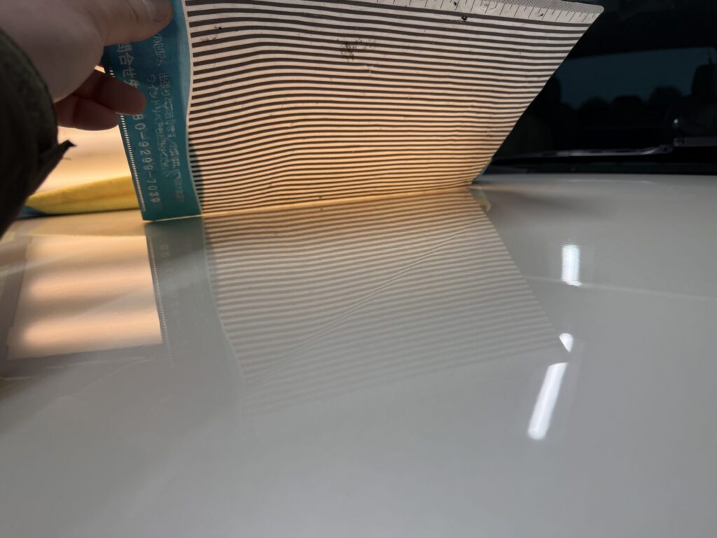 キャデラックエスカレードのボンネットのヘコミをデントリペア