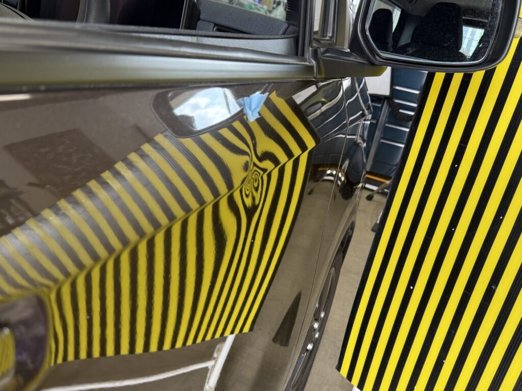 日産サクラ運転席ドアのヘコミをデントリペア