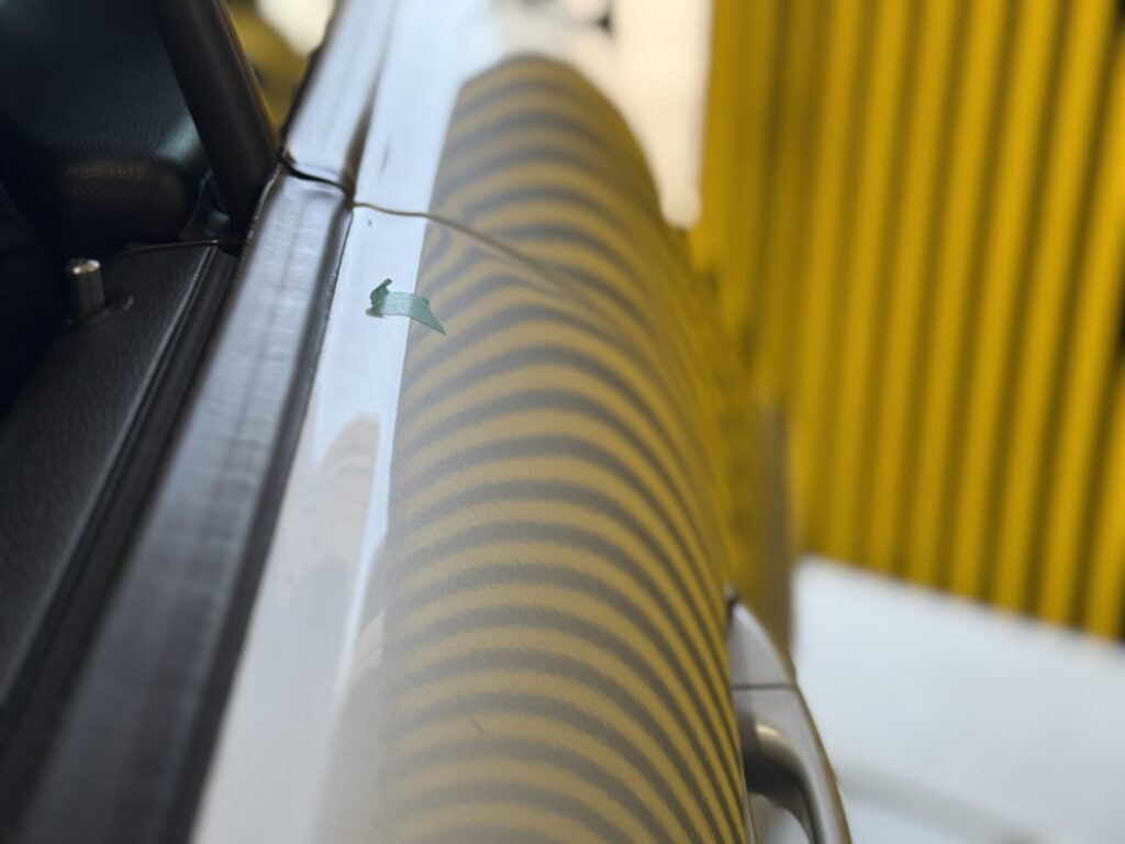 メルセデスベンツSLK55の運転席ドアのヘコミをデントリペア